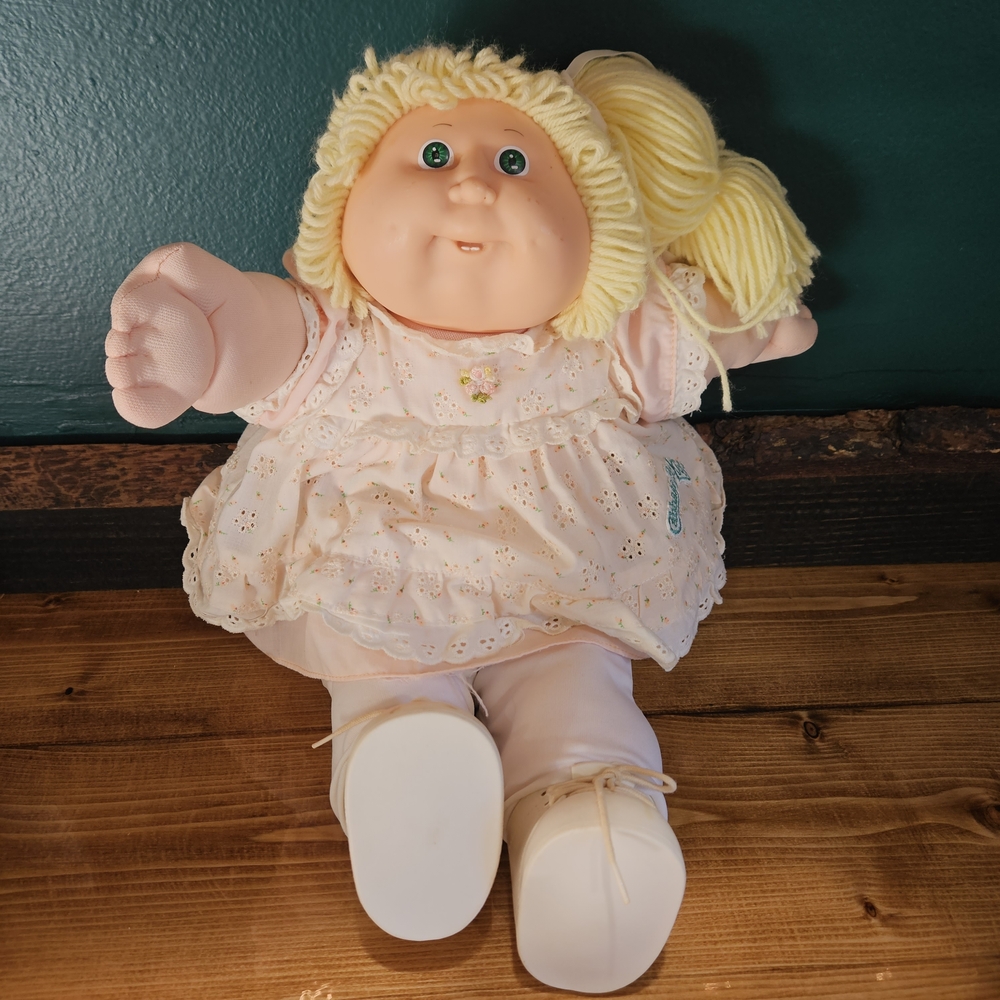 1985 Cabbage Patch Doll with Peach Dress and Blonde Yarn Hair